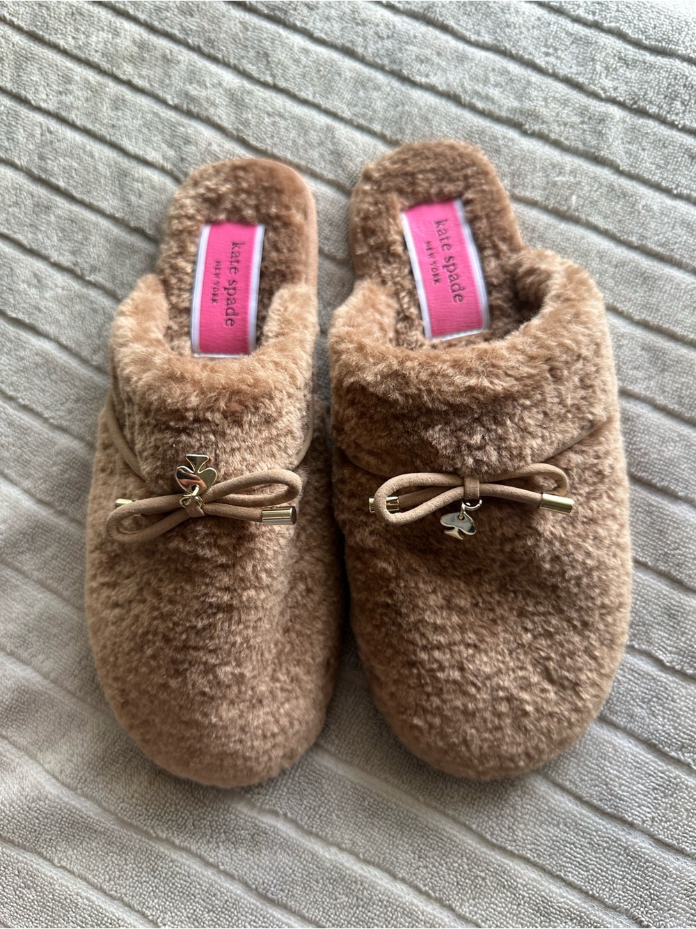 kate spade tan plush slip-on mules with bow and charm